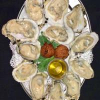 Oysters on 1/2 Shell · By the dozen.