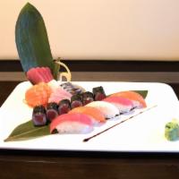 7. Sushi Sashimi Platter for 1 · 5 pieces of sushi, 7 pieces of sashimi and a California roll.