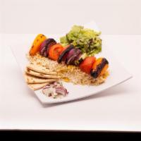 7. Veggie Kabob with Rice and Hummus · Served with fresh bread, salad, and saffron rice.