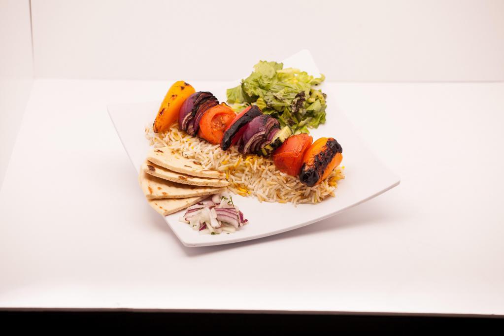 7. Veggie Kabob with Rice and Hummus · Served with fresh bread, salad, and saffron rice.