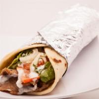 14. Gyro Wrap · Served with lettuce, tomatoes, onions, pickles, garlic sauce, feta cheese and tzatziki. Serv...