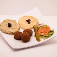 Appetizer Sampler · 3 pieces of falafel, hummus and babaghanoush.  Served with our homemade bread.