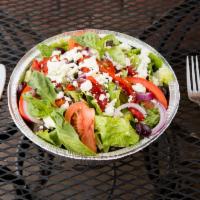 Greek Salad · Romaine lettuce topped with red onion, roasted peppers, tomatoes, feta cheese and Kalamata o...