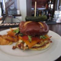 Valter's Chicken · Marinated chicken breast, bacon, roasted peppers, onions, almonds and smoked cheddar on a pr...