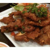 Salt and Pepper Pork Chop · Hot and spicy.
