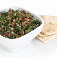 Tabouli Salad · Chopped parsley, tomatoes, onions, cracked wheat, olive oil and lemon juice. Vegetarian.
