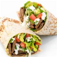 Gyro Laffa · Gyro, tomatoes, cucumbers, onions, parsley and tzatziki sauce. Served with lettuce.