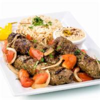Kafta Kabob · Served with top shelf ground beef with onions and parsley served with choice of side.