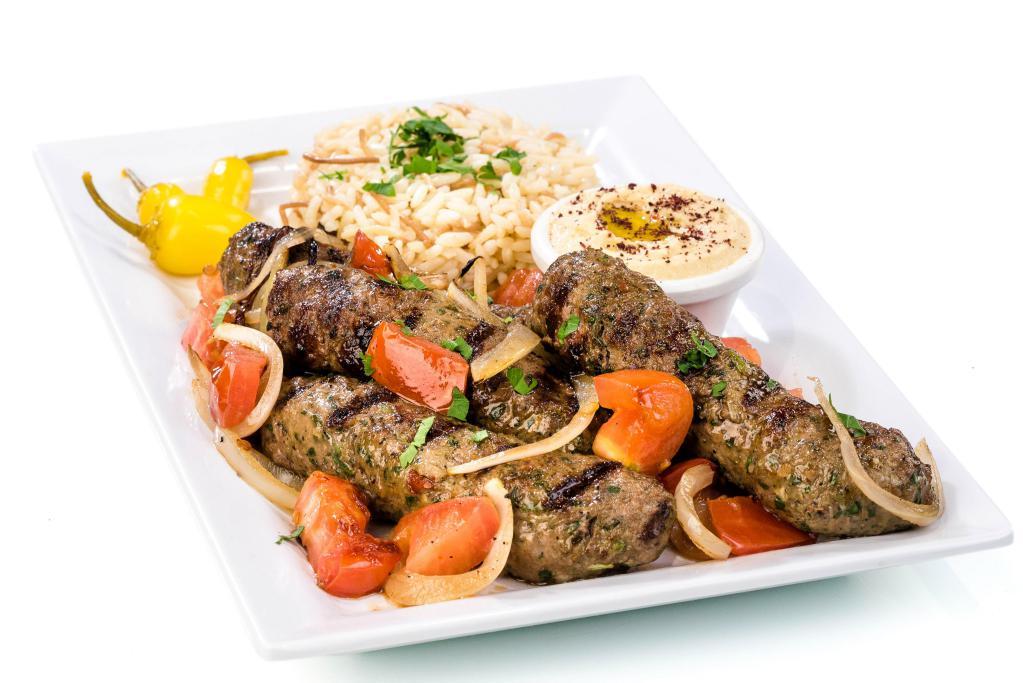 Kafta Kabob · Served with top shelf ground beef with onions and parsley served with choice of side.
