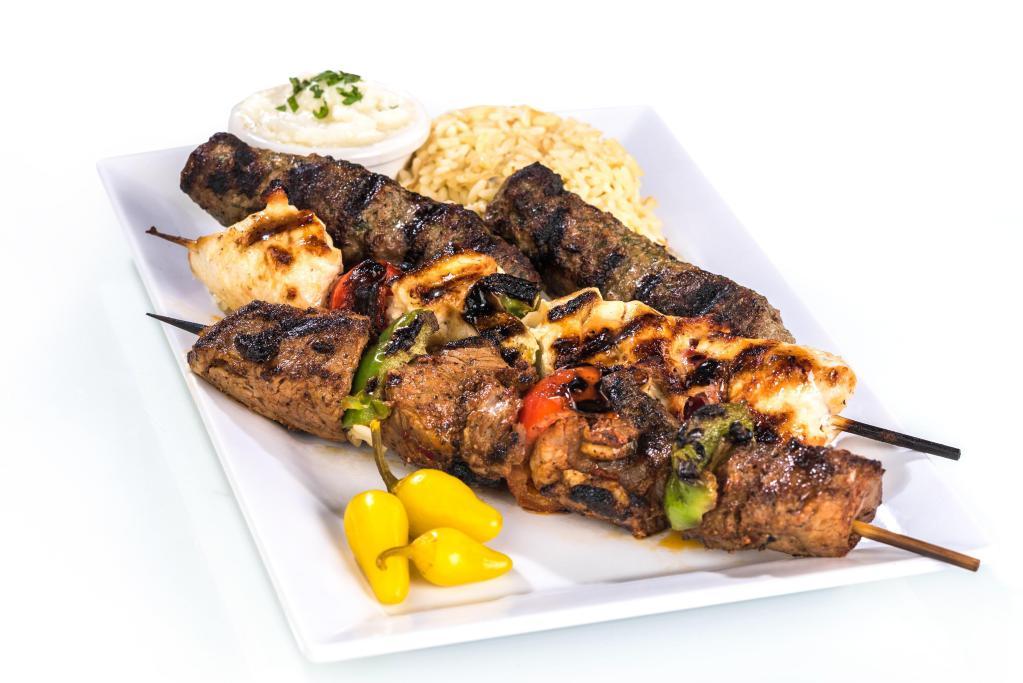 Combination Kabob · 3 skewer combination of chicken, filet and kafta skewers served with choice of side.