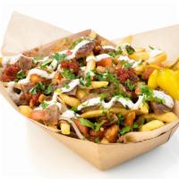 Gyro Fries · Crispy fries topped with gyro, grilled tomatoes and onions, tomatoes and tzatiki sauce and h...
