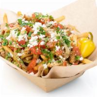 Chicken Feta Fries · Crispy fries topped with chicken, Greek feta cheese, pickles, grilled tomatoes and onions an...