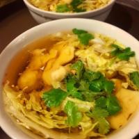 Wonton Soup · Thai style wonton soup in clear chicken broth with cilantro.