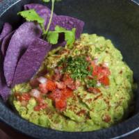 Guacamole Dip · A hearty blend of fresh avocado, spices, pico de gallo, cilantro and lime. Gluten free.