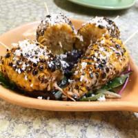 Corn Esquites · Mexican char-grilled corn on the cob coated with chipotle infused aioli, slathered with coti...