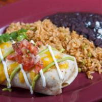 Burrito Mar & Tierra · Skirt steak, Mexican chorizo, chicken and shrimp with tequila salsa verde. All wrapped in a ...