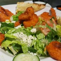 Buffalo Shrimp Salad · Romaine, tomato, cucumber, croutons, bleu cheese crumbles, 8 hand breaded Buffalo shrimp cho...