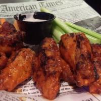 Classic Pub Wings · Served with celery and carrots and choice or ranch or bleu cheese.