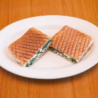 Chicken Mediterranean Panini · Grilled lemon herb chicken, feta cheese sauteed spinach and olive tapenade.