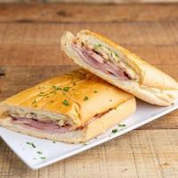 Cubano Regular Sandwich · All-time favorite sandwich. Right down hearty and MMM so good! Ham, cheese, pork a touch of ...