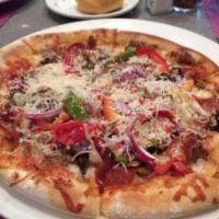 Sausage-Pepperoni Pizza · Sausage and pepperoni with mushrooms, tri colored peppers, red onion and tomato sauce.