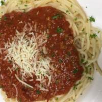 Spaghetti · With marinara or Bolognese meat sauce topped with Romano cheese. Served with a house salad a...