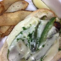 Italian Sausage Sandwich · Char grilled Italian sausage topped with peppers, onions and provolone cheese on a sub bun a...