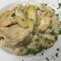 Chicken Piccata · Sauteed breast of chicken with artichokes, capers, shallots, garlic and a white wine lemon s...