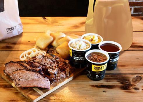 Classic Family Pack + Gallon Lemonade · 1 LB brisket, 1 LB pulled pork, 1 each of medium potato salad, coleslaw, baked beans, 6 dinner rolls and your choice of sauce. Plus a gallon of lemonade. **No substitutions**