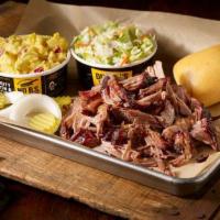 1 Meat Plate + BYC · Choice of one slow-smoked meat served with two sides and a roll + drink