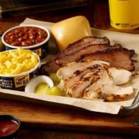 2 Meat Plate + BYC · Try your favorite combination of two slow-smoked meats served with two sides and a roll + dr...