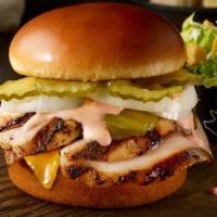 Barbecue Ranch Bird Sandwich · Tender smoked marinated chicken with sweet and tangy barbecue ranch sauce, cheddar cheese, c...