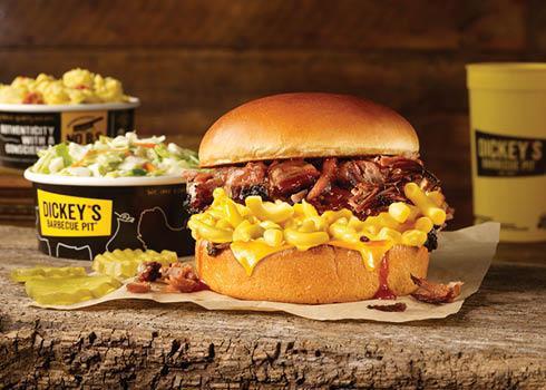 Brisket Double Cheese Sandwich · Smoked Brisket, mac n cheese, and cheddar cheese all piled high on a toasted bun