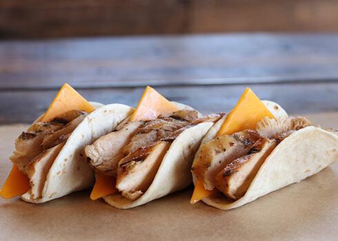 Chicken & Cheese Taco · Smoked chicken breast topped with delicious cheddar cheese