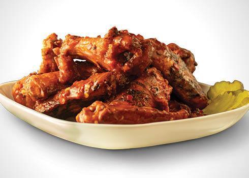 18 Piece Wings · 18 pieces of Pit Smoked Wings with 2 choices of flavor.