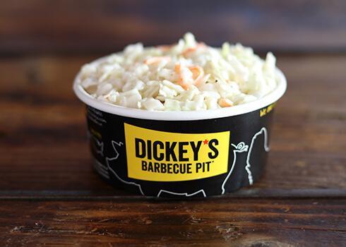 Cabbage Slaw · Finely diced cabbage and carrots, seasoned with a tangy and sweet coleslaw dressing.