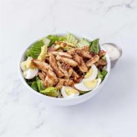 California Cobb Salad · Hard boiled egg, avocado, tomato, grilled chicken, red onion, bacon, creamy blue cheese dres...