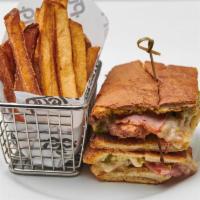 Cubano Sandwich · Roasted pork, ham, Swiss cheese, pickles and cuban salsa with your choice of french fries, s...
