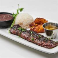Grilled Skirt Steak · Served with rice, beans and sweet plantains.