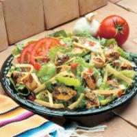 Fiesta Ensalada · Lettuce, cheese, tomato, tortilla strips and choice of vinaigrette, cilantro Caesar or ranch...