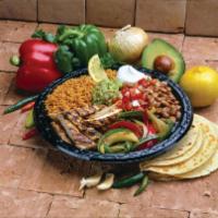 Fajita Plate · Served with rice, beans, pico de gallo, guacamole, sour cream and tortillas.