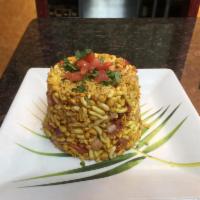 Bhel Puri · Puffed rice, potatoes, onions, wafers and crisp noodles.  Served with chutney.