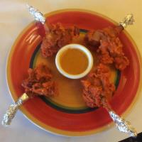 CHICKEN LOLLIPOP- appitizer · A Chicken wings coated in tasty corn flour batter,mixed with Indian spices and deep fried . ...