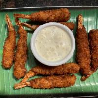 Coconut Shrimps - New appetizer ( 8 Pcs) · Bay shrimps hand breaded and coated with coconut flakes . Deep fried and served with tomato ...