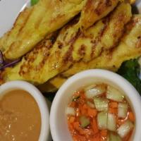 2. 4 Piece Satay Chicken · Marinated in coconut cream with herbs and spices grilled served with peanut sauce and cucumb...