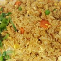 15. Pineapple Fried Rice Dish · Carrot, peas, onion, curry powder, pineapple, and egg.