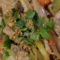 11. Ginger Dish · Fresh ginger root, carrot, celery, bell pepper, onion, and bean sauce. Served with steamed r...