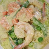 56. Green Curry · Coconut milk with bamboo shoot, basil, eggplant, bell pepper, peas and carrot. Served with s...