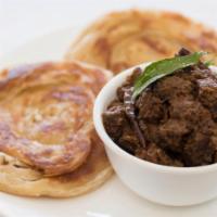 Malaikottai Mutton Sukka Curry · Boneless pieces of goat cooked in special chettinadu spices.