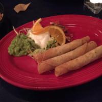 3 Taquitos · Three shredded beef, chicken, or carnitas taquitos, served with guacamole, sour cream and pi...